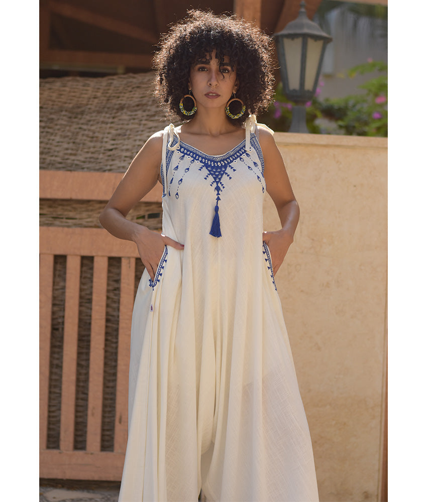 White Siwa Embroidered Linen Flowy Jumpsuit/Dress handmade in Egypt & available at Jozee Boutique.