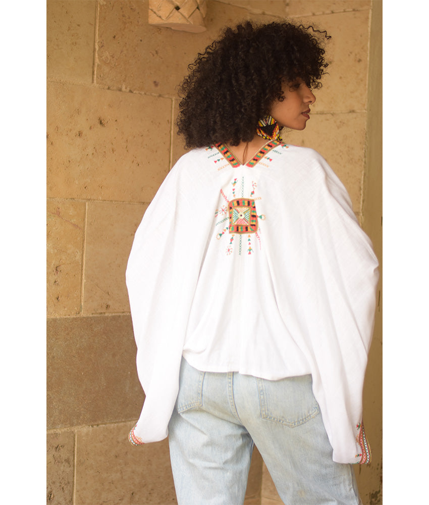White Siwa Embroidered Linen Bolero made in Egypt & available at Jozee Boutique.