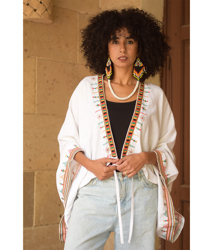 White Siwa Embroidered Linen Bolero made in Egypt & available at Jozee Boutique.