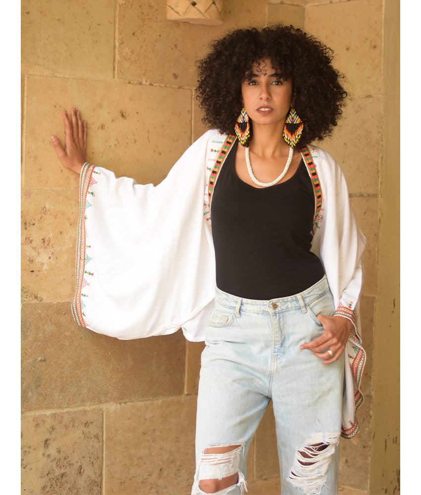 White Siwa Embroidered Linen Bolero made in Egypt & available at Jozee Boutique.