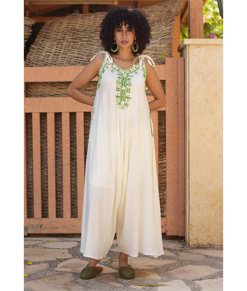 White Siwa Embroidered Linen Flowy Jumpsuit/Dress handmade in Egypt & available at Jozee Boutique.