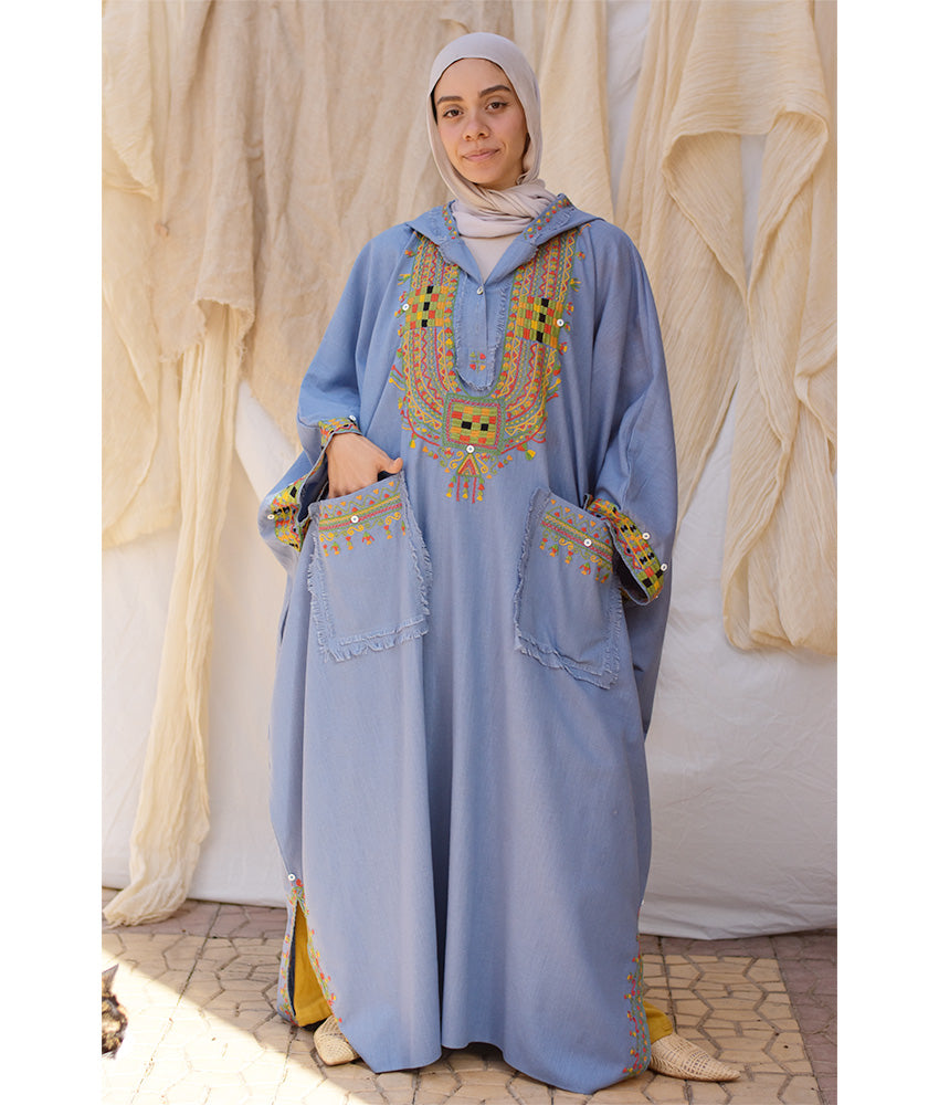 Denim blue Siwa Embroidered Linen Kaftan with Hoodie handmade in Egypt & available at Jozee Boutique.