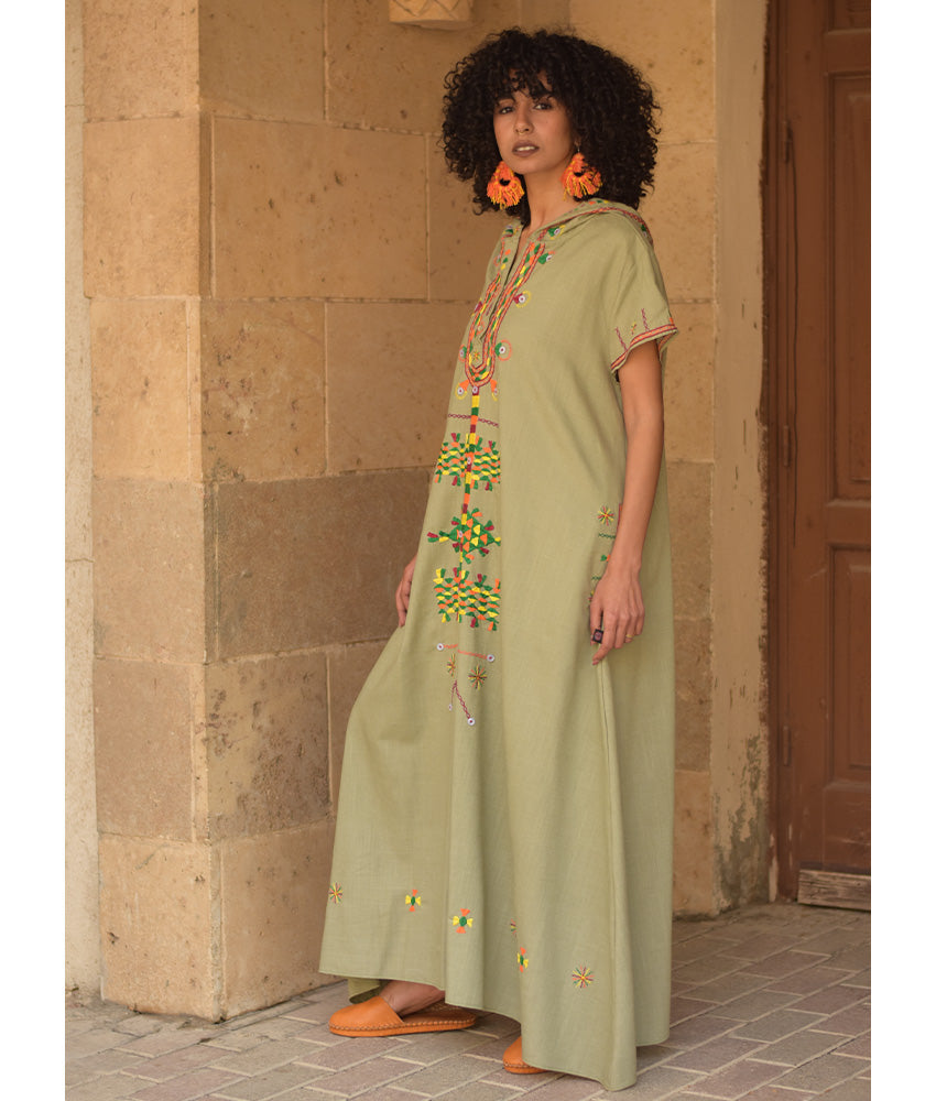 Light olive Siwa Heavily Embroidered Linen Dress with Hoodie handmade in Egypt & available at Jozee Boutique.