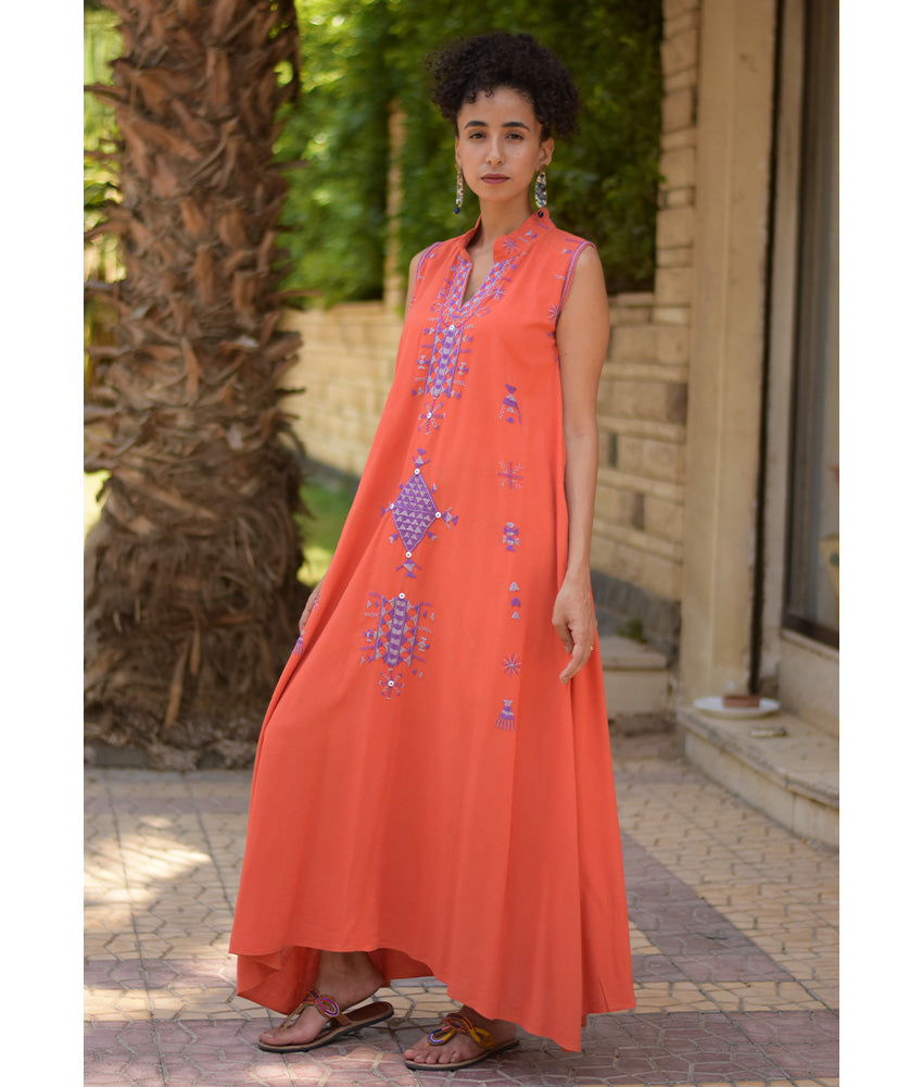 Orange Siwa Embroidered Linen Japanese Dress handmade in Egypt & available at Jozee Boutique.