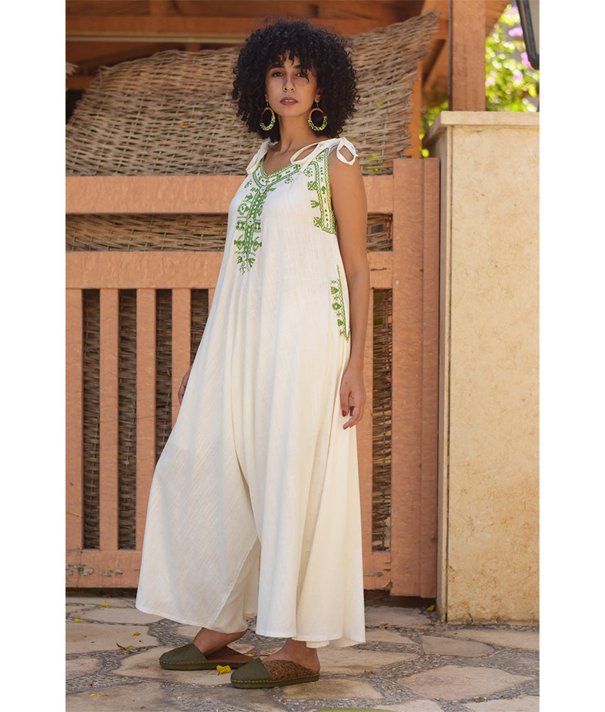 White Siwa Embroidered Linen Flowy Jumpsuit/Dress handmade in Egypt & available at Jozee Boutique.