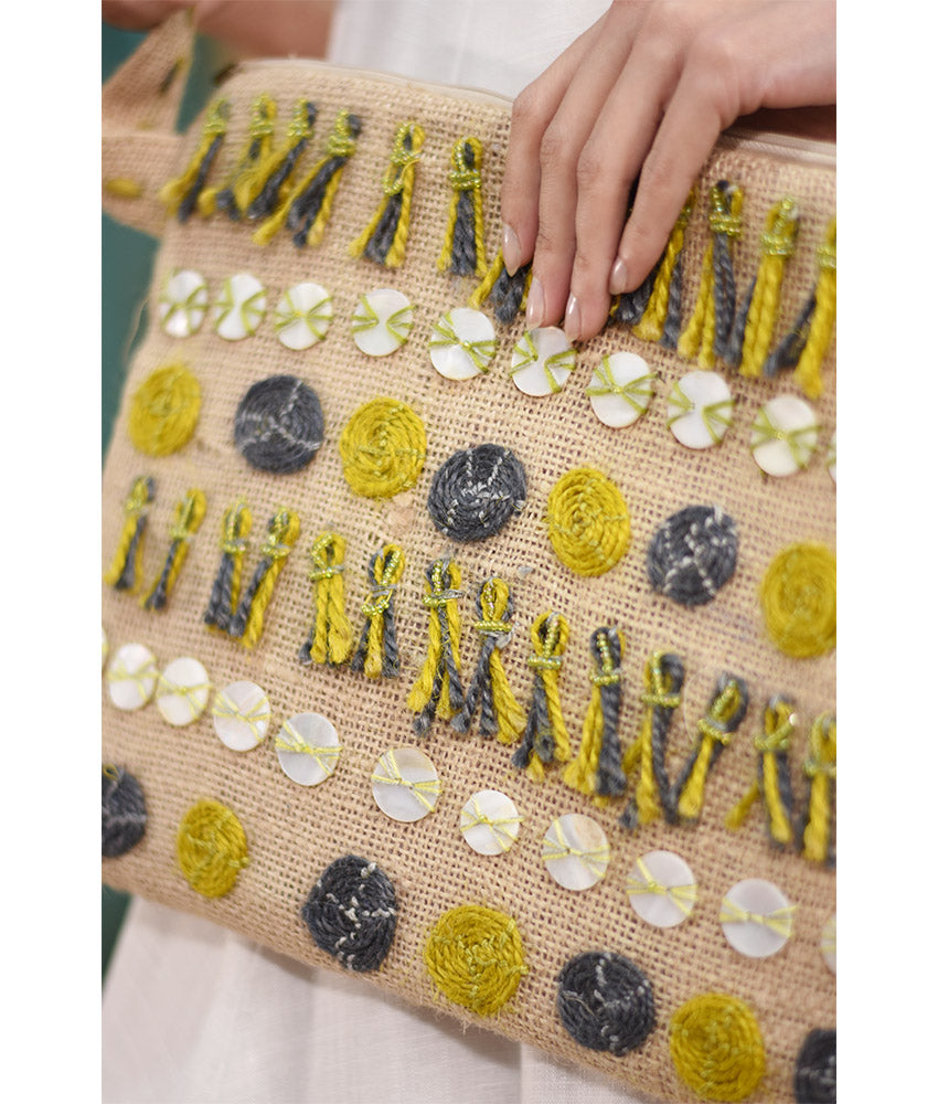 Beige Embroidered Burlap Clutch with Buttons handmade in Egypt & available at Jozee Boutique.