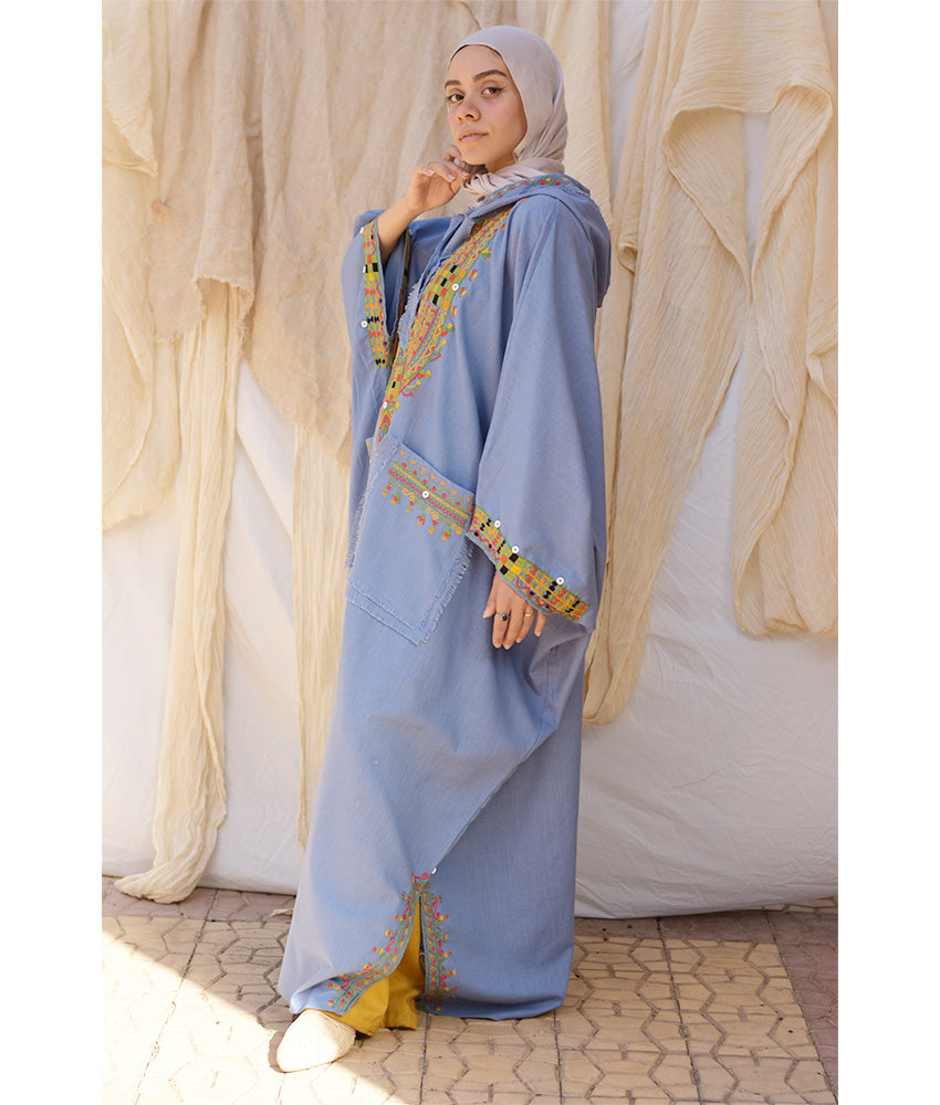 Denim blue Siwa Embroidered Linen Kaftan with Hoodie handmade in Egypt & available at Jozee Boutique.