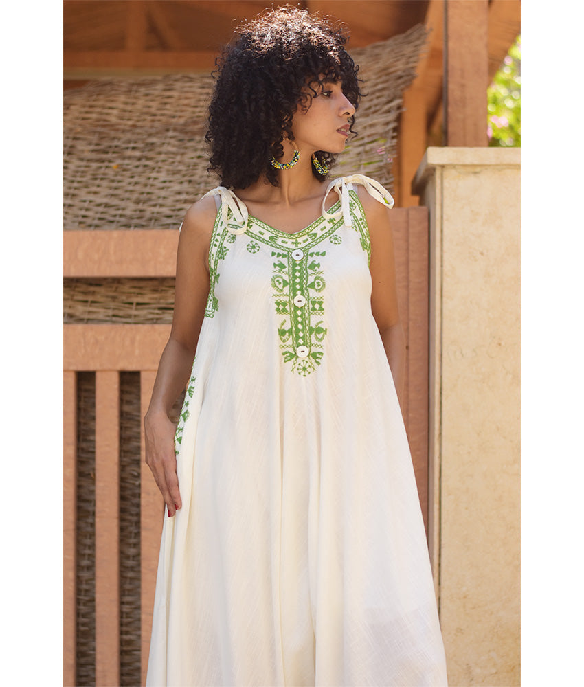 White Siwa Embroidered Linen Flowy Jumpsuit/Dress handmade in Egypt & available at Jozee Boutique.