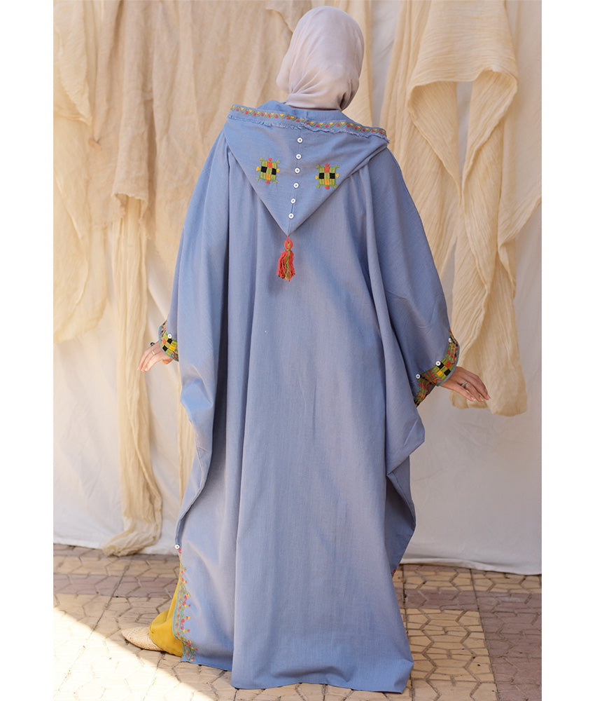Denim blue Siwa Embroidered Linen Kaftan with Hoodie handmade in Egypt & available at Jozee Boutique.