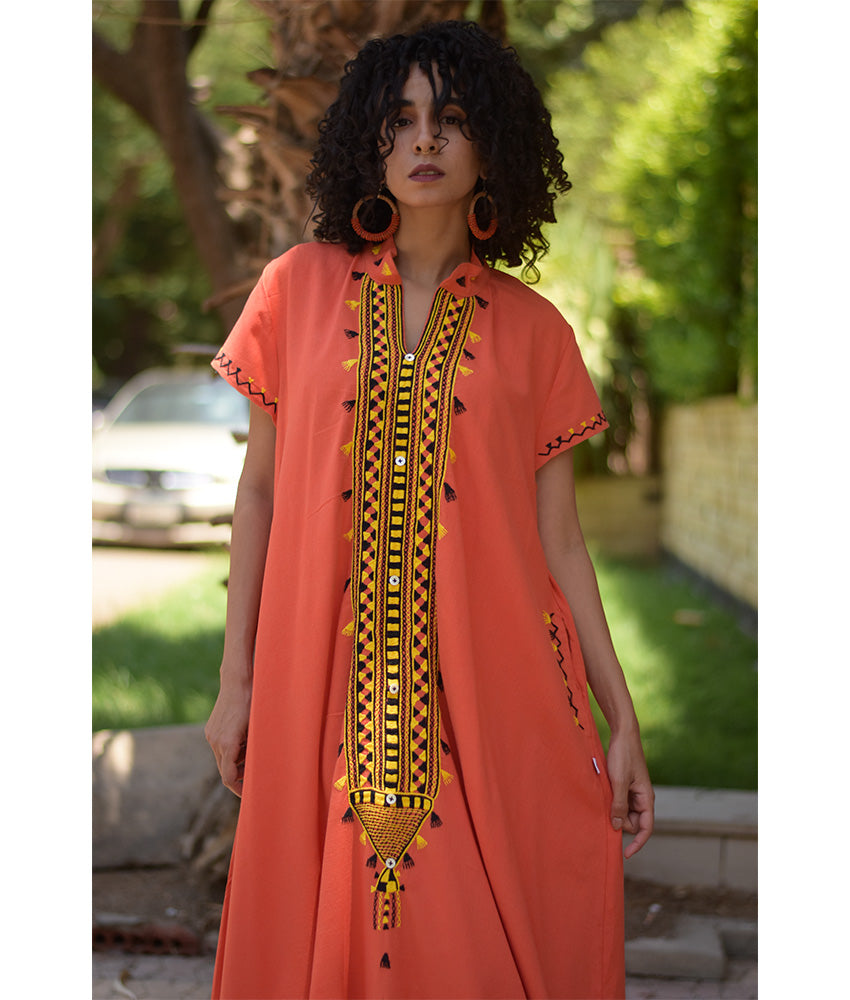 Orange Siwa Embroidered Linen Japanese Dress handmade in Egypt & available at Jozee Boutique.