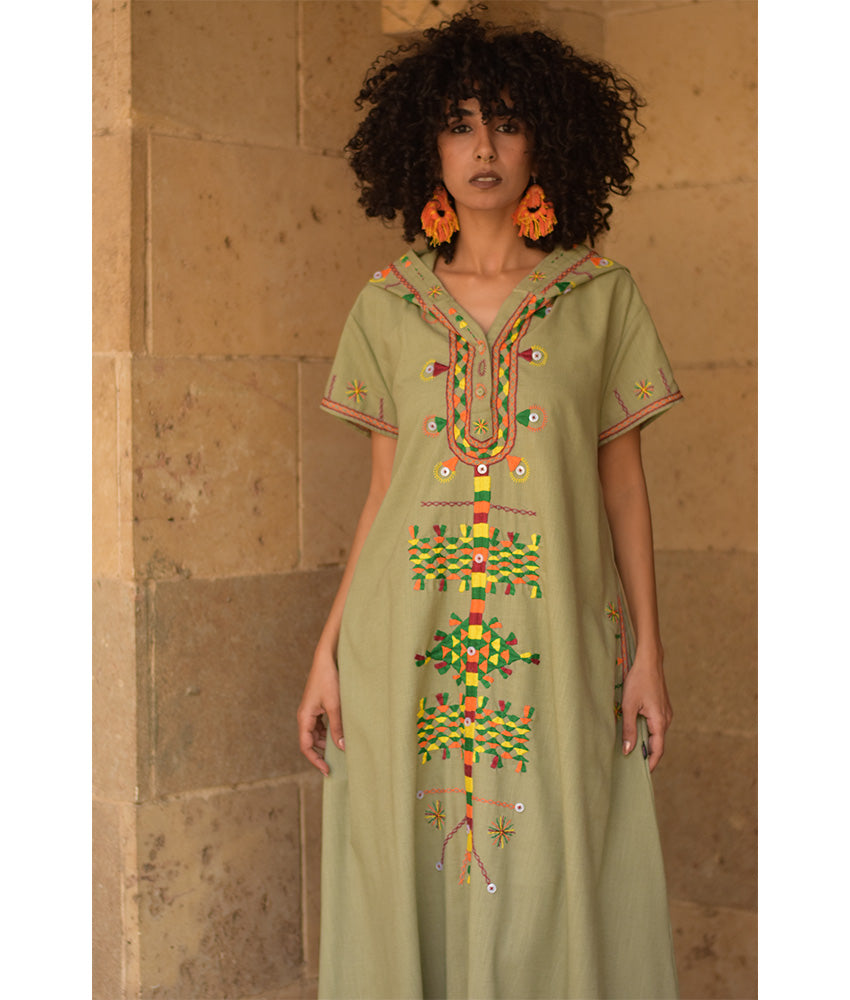 Light olive Siwa Heavily Embroidered Linen Dress with Hoodie handmade in Egypt & available at Jozee Boutique.