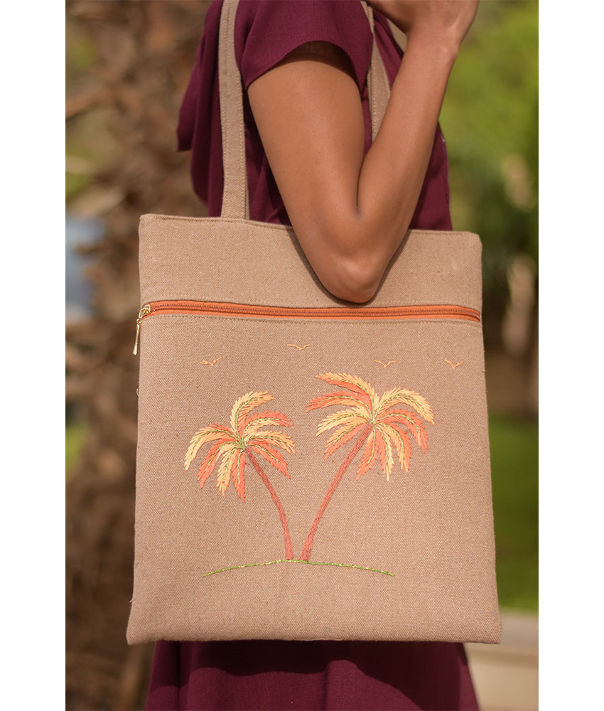 Dark Beige Embroidered Palm Linen Tote Bag handmade in Egypt & available at Jozee Boutique.handmade in Egypt & available at Jozee Boutique.