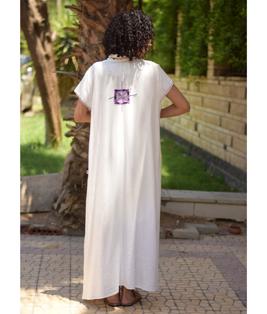White Siwa Embroidered Linen Japanese Dress handmade in Egypt & available at Jozee Boutique.