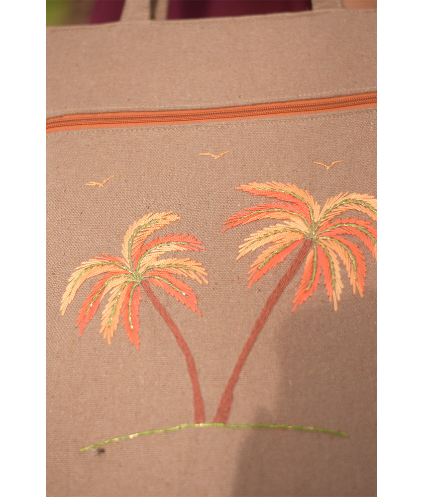 Dark Beige Embroidered Palm Linen Tote Bag handmade in Egypt & available at Jozee Boutique.handmade in Egypt & available at Jozee Boutique.