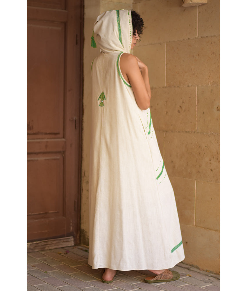Off white Siwa Heavily Embroidered Linen Dress with Hoodie handmade in Egypt & available at Jozee Boutique.