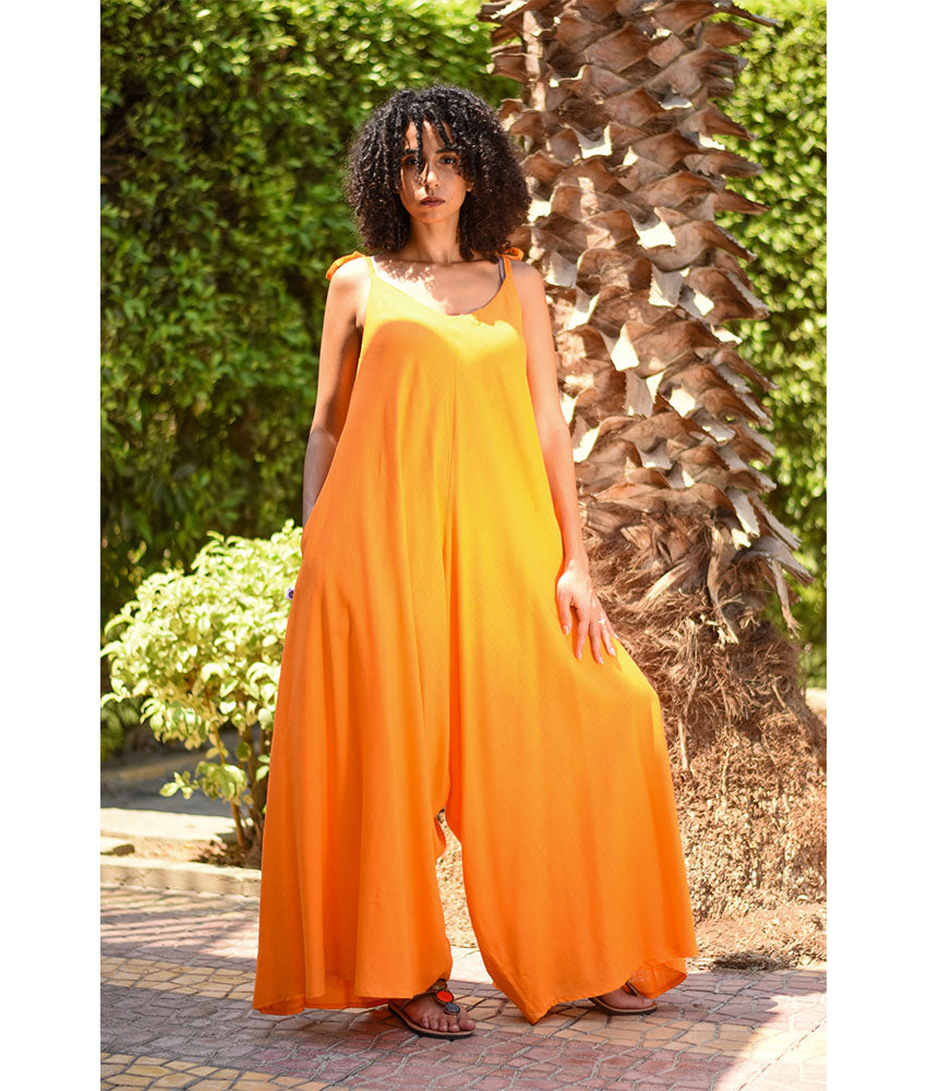 Orange Flowy Jumpsuit/Dress handmade in Egypt & available at Jozee Boutique.