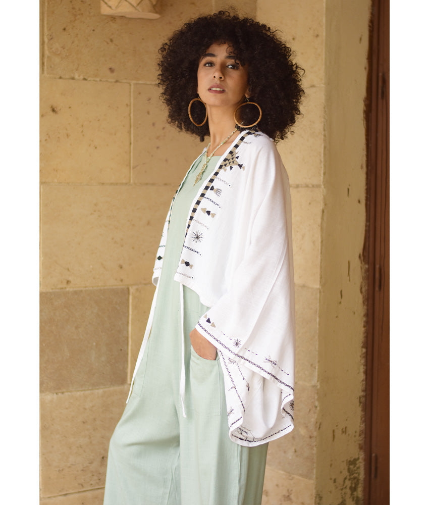 White Siwa Embroidered Linen Bolero made in Egypt & available at Jozee Boutique.