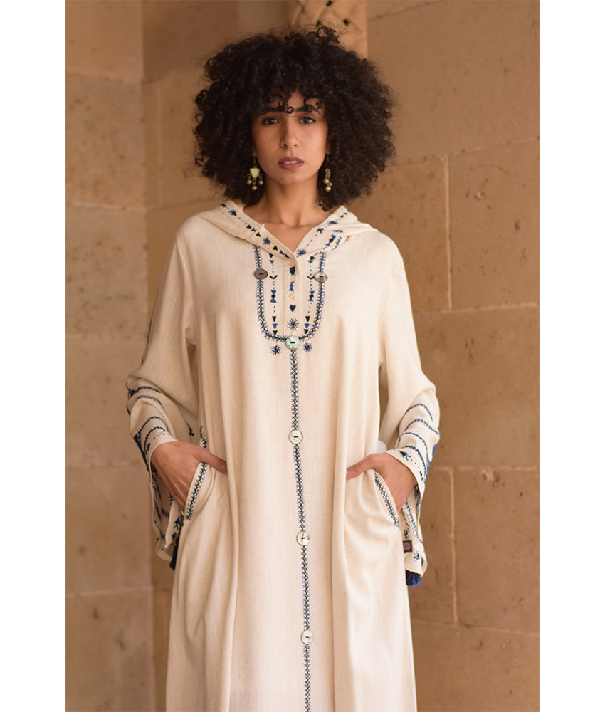 Off white Siwa Embroidered Linen Dress with Hoodie handmade in Egypt & available at Jozee Boutique.