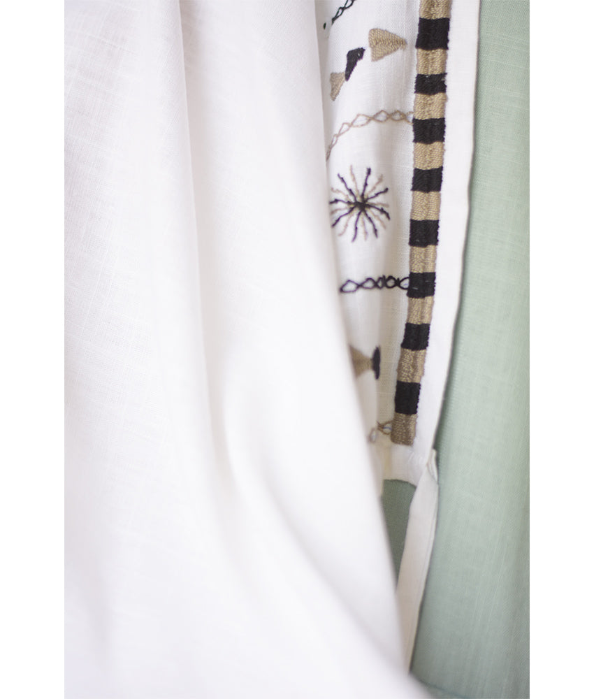 White Siwa Embroidered Linen Bolero made in Egypt & available at Jozee Boutique.