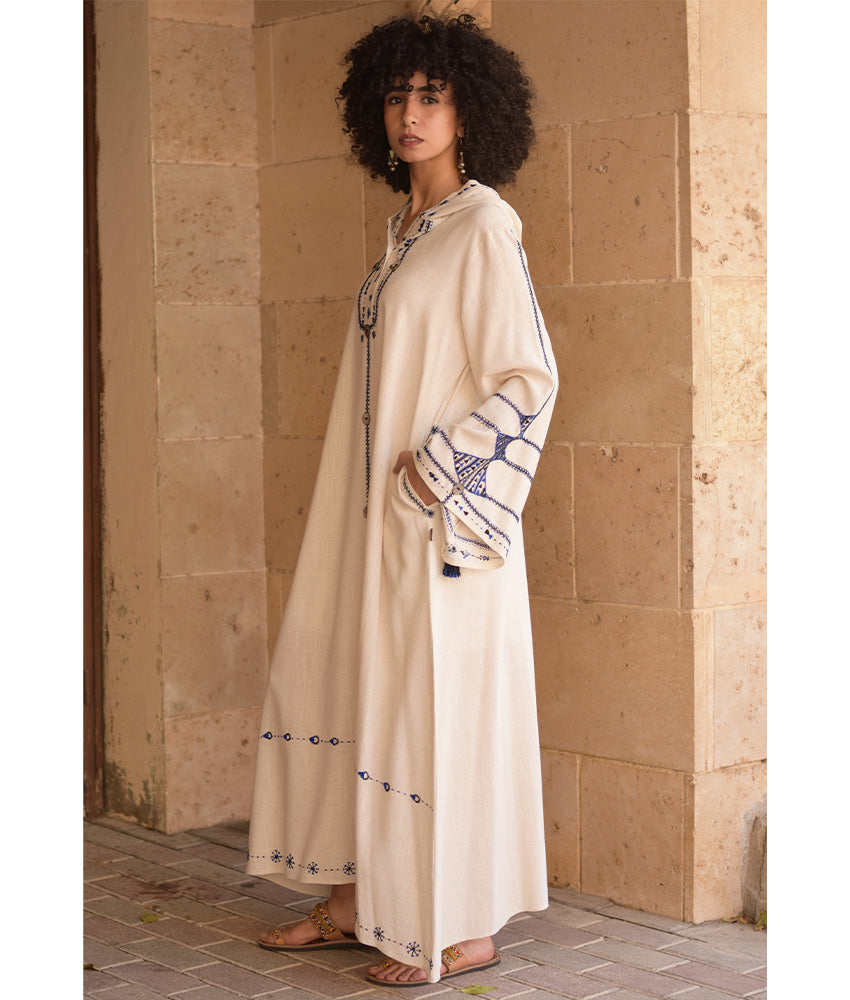 Off white Siwa Embroidered Linen Dress with Hoodie handmade in Egypt & available at Jozee Boutique.