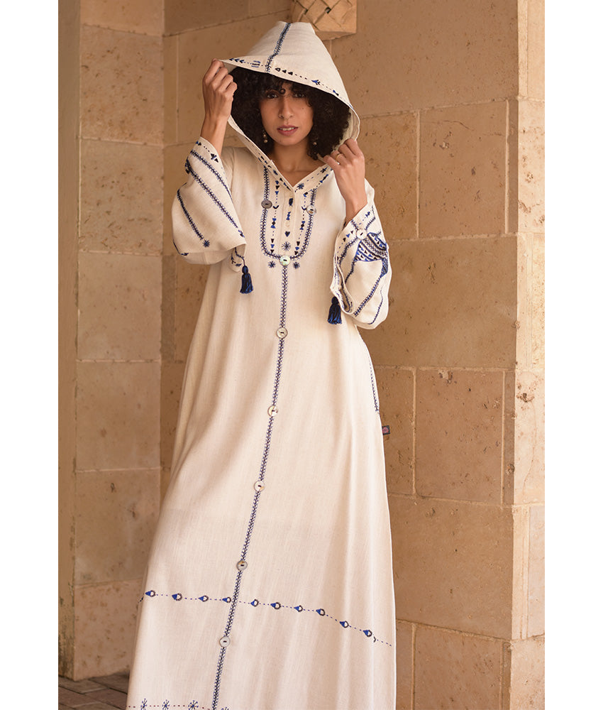 Off white Siwa Embroidered Linen Dress with Hoodie handmade in Egypt & available at Jozee Boutique.