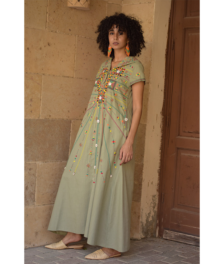 Light olive Siwa Heavily Embroidered Linen Dress with Hoodie handmade in Egypt & available at Jozee Boutique.