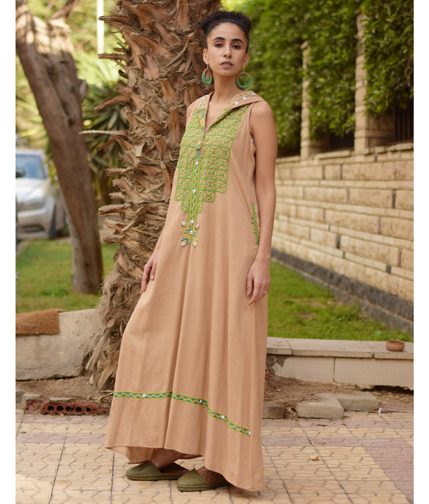 Dark beige Siwa Heavily Embroidered Linen Dress with Hoodie handmade in Egypt & available at Jozee Boutique.