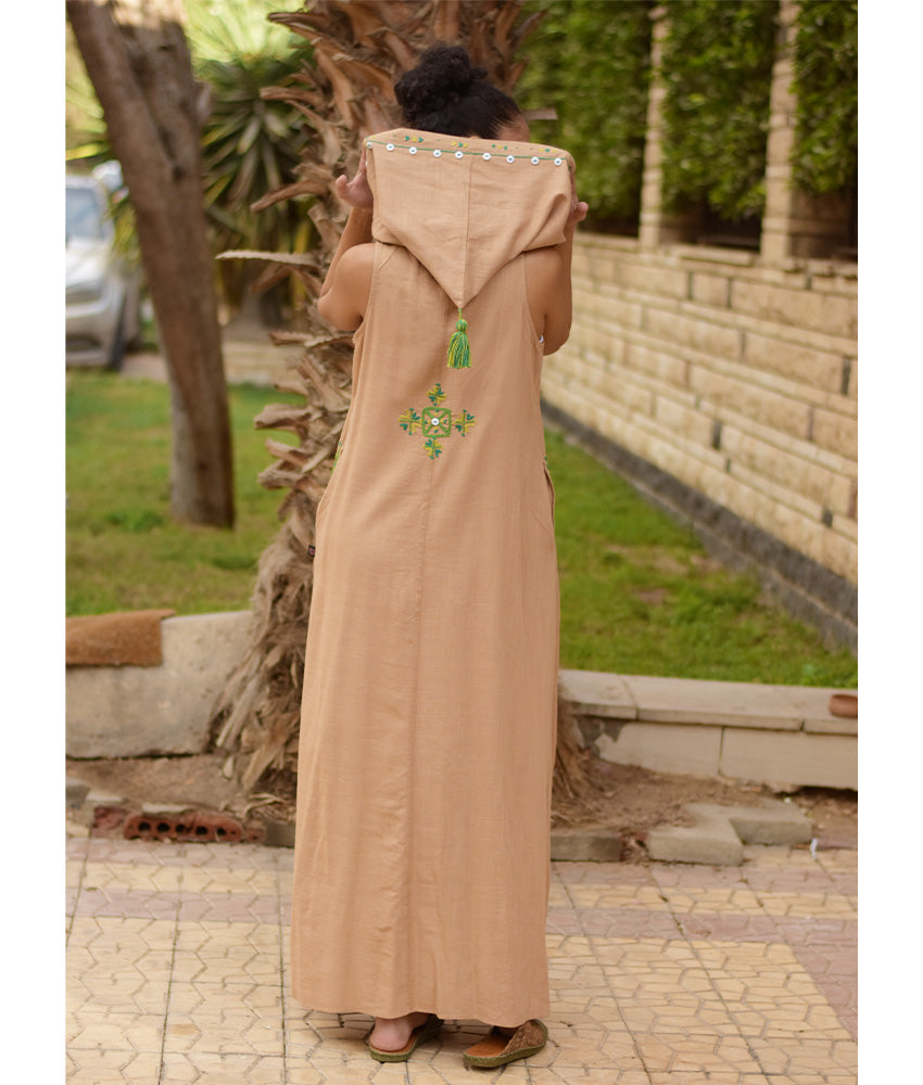 Dark beige Siwa Heavily Embroidered Linen Dress with Hoodie handmade in Egypt & available at Jozee Boutique.