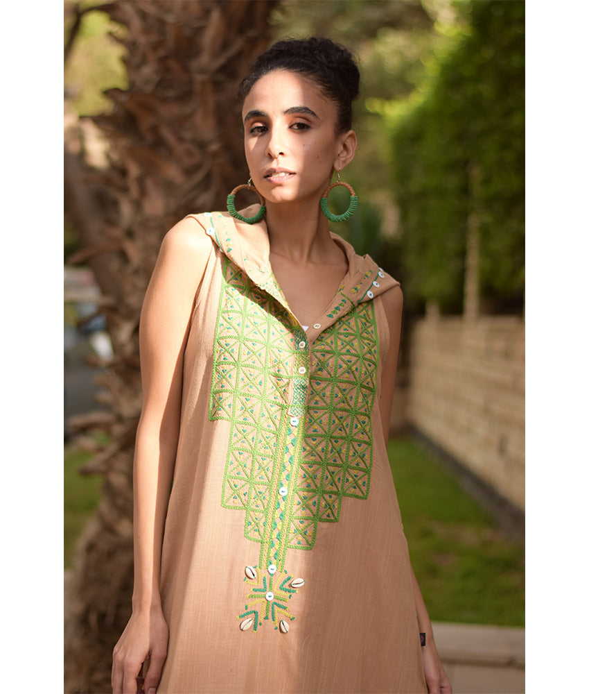 Dark beige Siwa Heavily Embroidered Linen Dress with Hoodie handmade in Egypt & available at Jozee Boutique.
