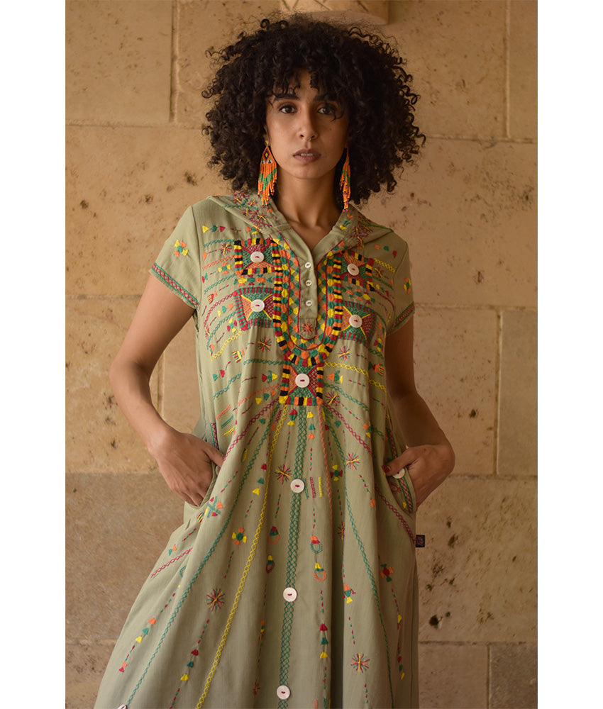 Light olive Siwa Heavily Embroidered Linen Dress with Hoodie handmade in Egypt & available at Jozee Boutique.