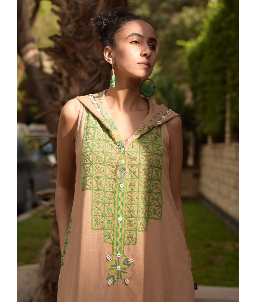 Dark beige Siwa Heavily Embroidered Linen Dress with Hoodie handmade in Egypt & available at Jozee Boutique.