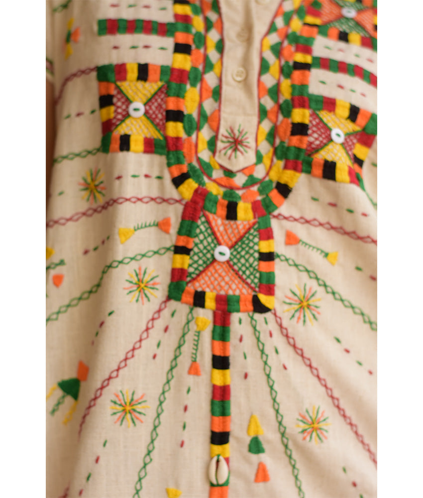 Off white Siwa Heavily Embroidered Linen Dress with Hoodie handmade in Egypt & available at Jozee Boutique.