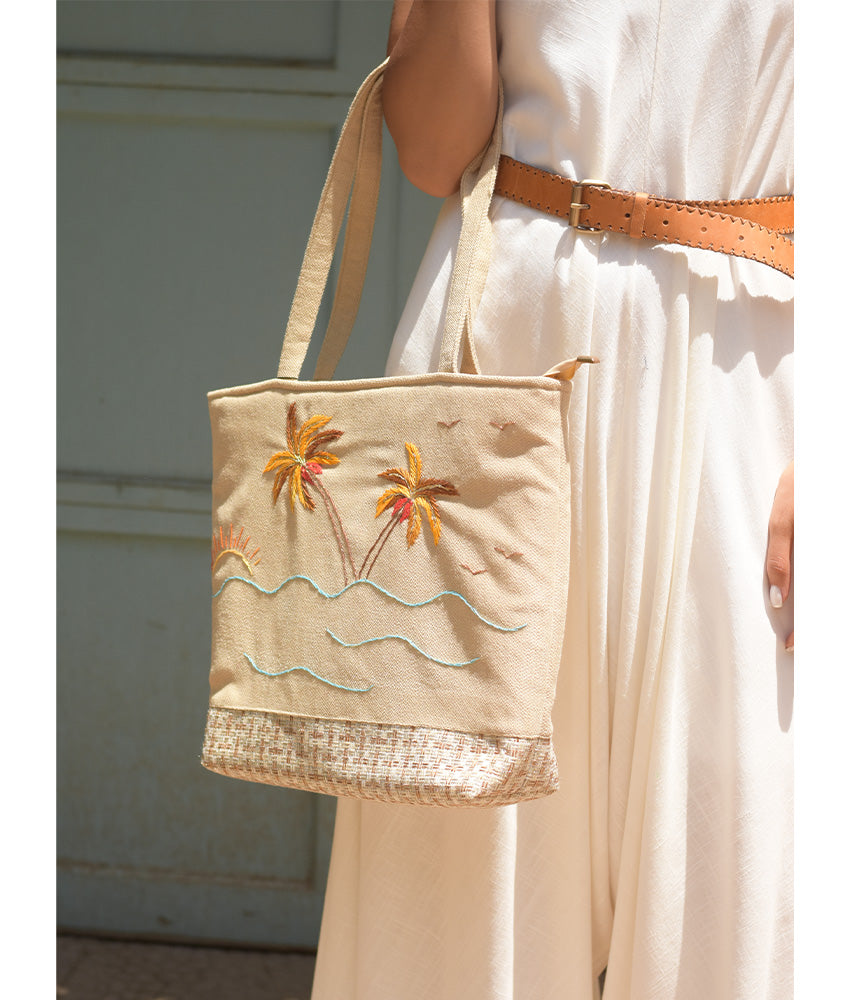 Off white Embroidered Palm Linen Tote Bag handmade in Egypt & available at Jozee Boutique.handmade in Egypt & available at Jozee Boutique.