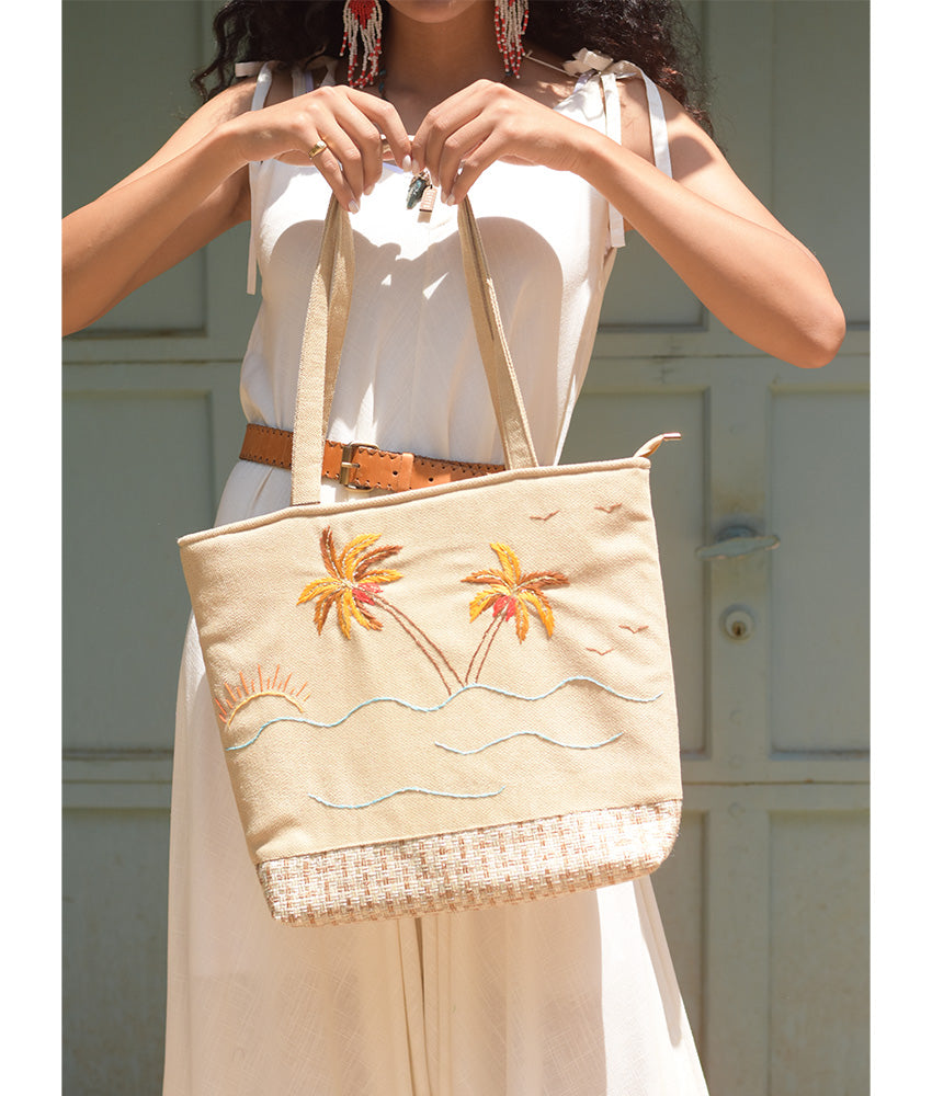 Off white Embroidered Palm Linen Tote Bag handmade in Egypt & available at Jozee Boutique.handmade in Egypt & available at Jozee Boutique.