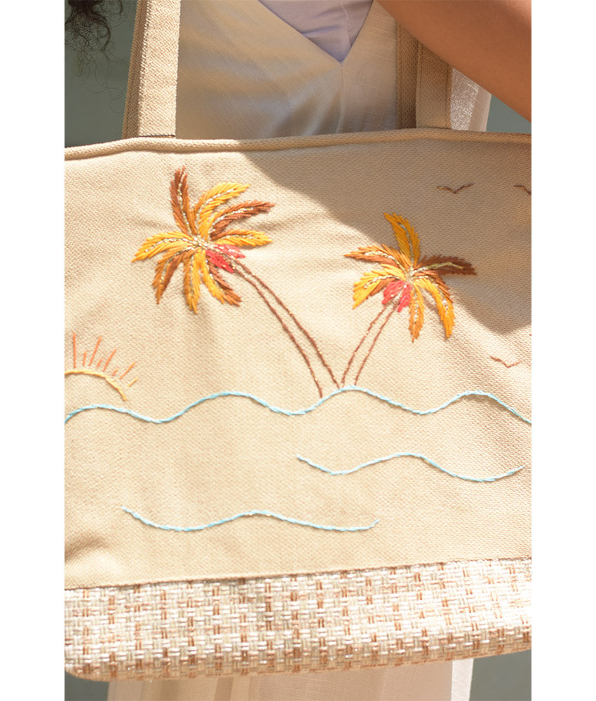Off white Embroidered Palm Linen Tote Bag handmade in Egypt & available at Jozee Boutique.handmade in Egypt & available at Jozee Boutique.