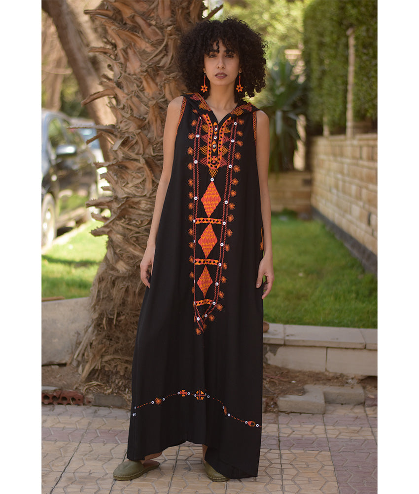 Black Siwa Heavily Embroidered Linen Dress with Hoodie handmade in Egypt & available at Jozee Boutique.