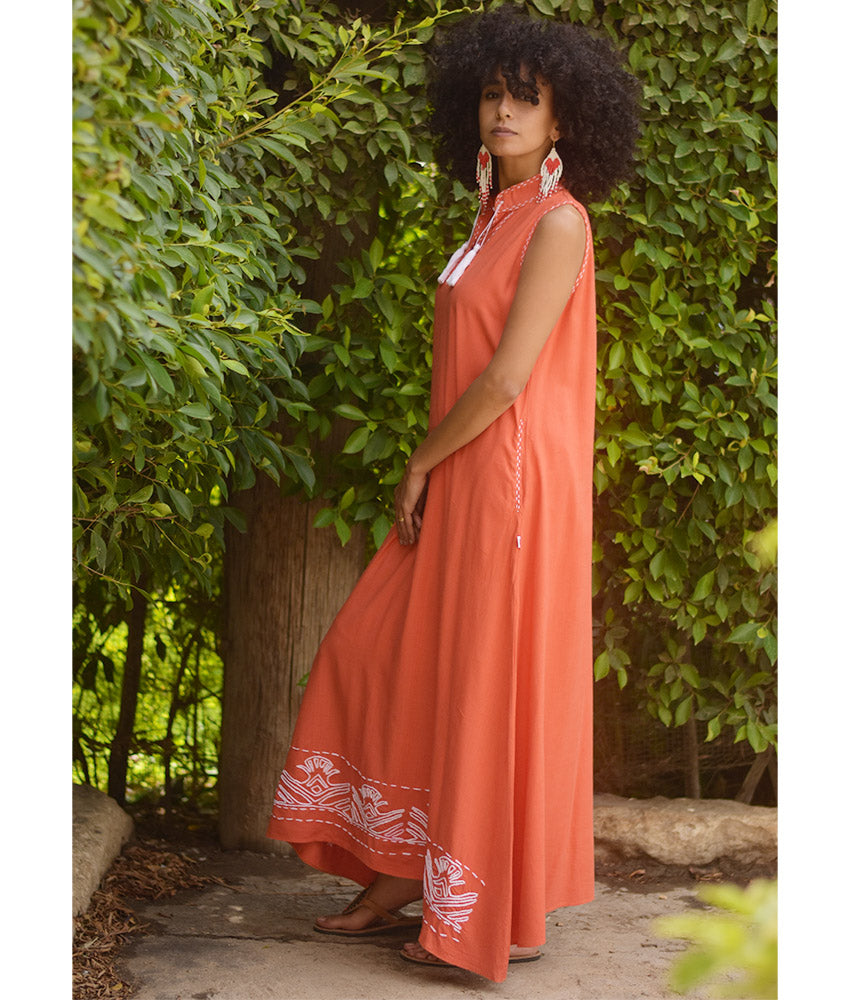 Orange Linen Dress with Ancient Egyptian Lotus Embroidery handmade in Egypt & available at Jozee Boutique.
