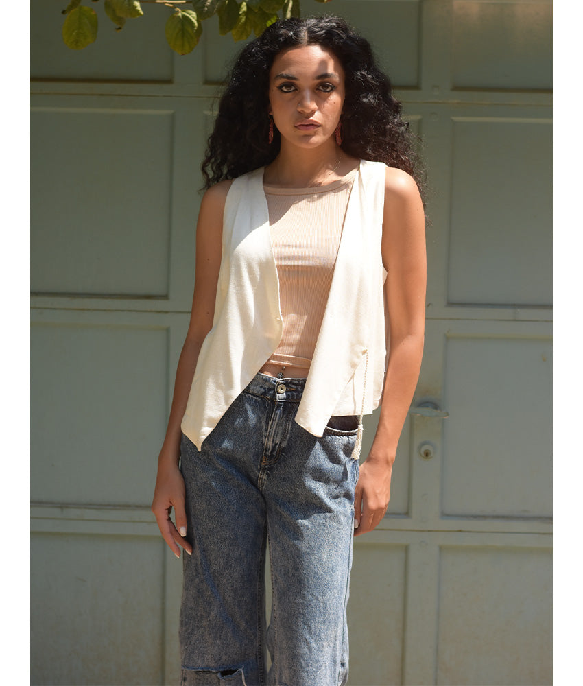 Off-White El Mahrousa Linen Wrap Vest handmade in Egypt & available at Jozee Boutique.