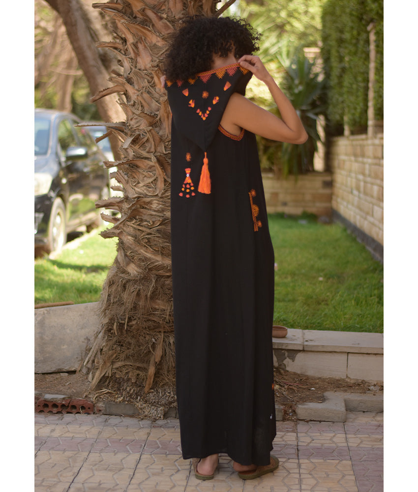 Black Siwa Heavily Embroidered Linen Dress with Hoodie handmade in Egypt & available at Jozee Boutique.
