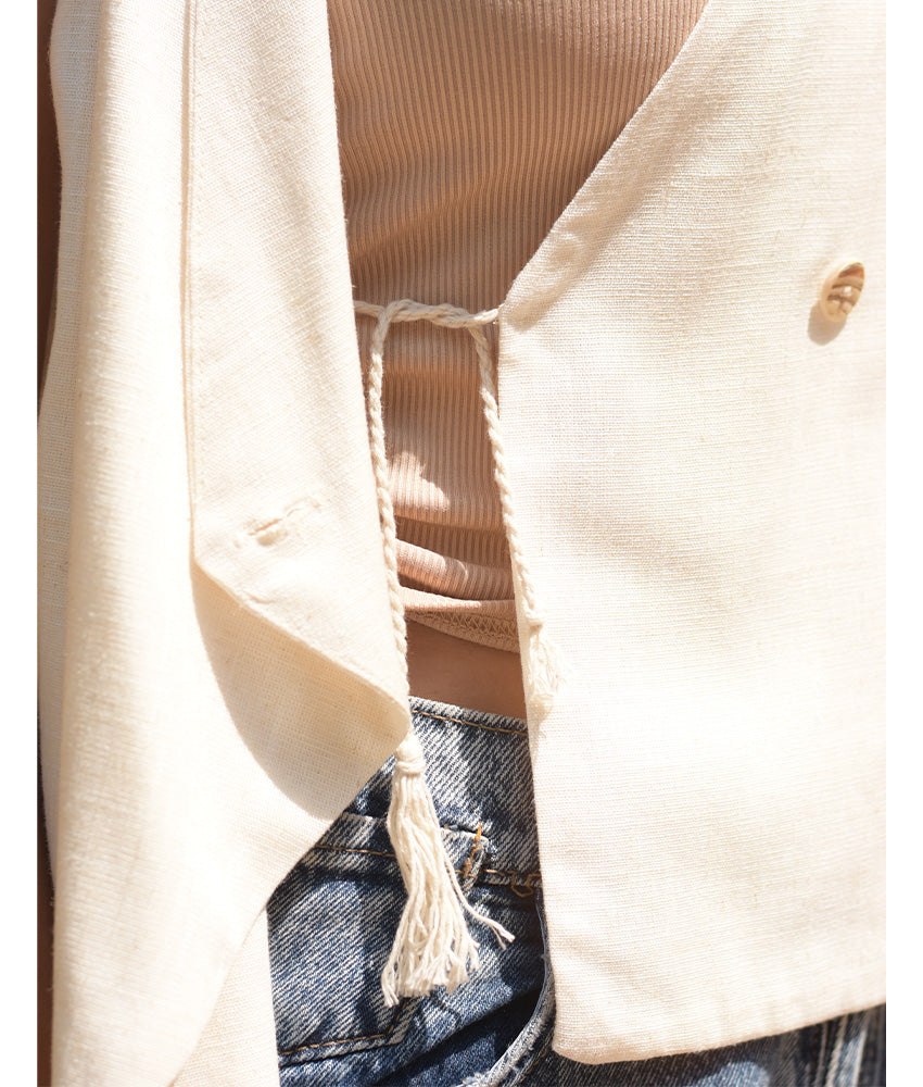 Off-White El Mahrousa Linen Wrap Vest handmade in Egypt & available at Jozee Boutique.