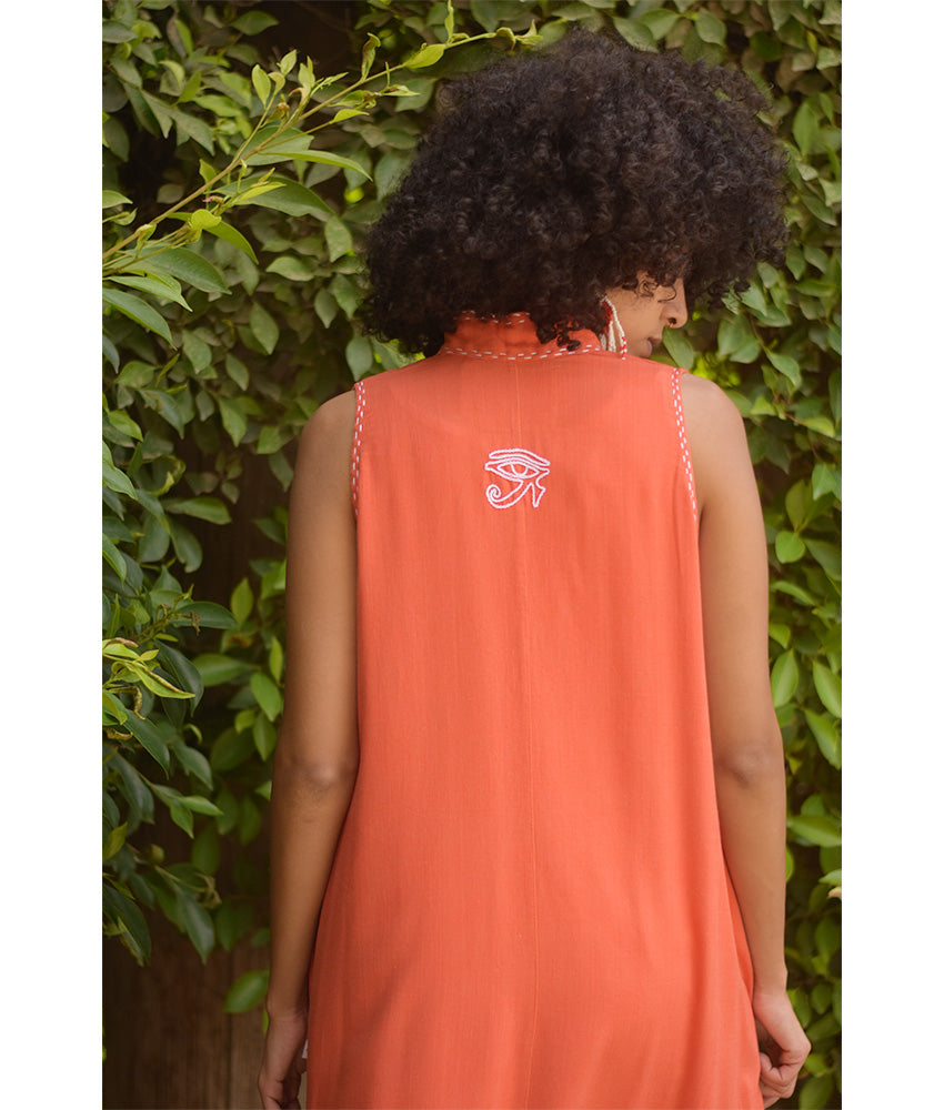 Orange Linen Dress with Ancient Egyptian Lotus Embroidery handmade in Egypt & available at Jozee Boutique.