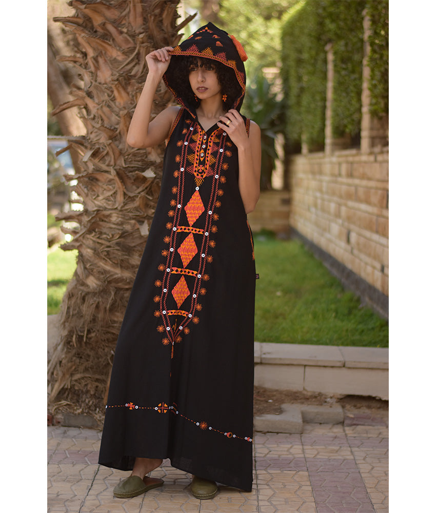 Black Siwa Heavily Embroidered Linen Dress with Hoodie handmade in Egypt & available at Jozee Boutique.