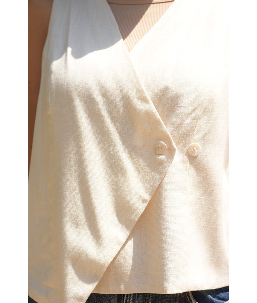 Off-White El Mahrousa Linen Wrap Vest handmade in Egypt & available at Jozee Boutique.