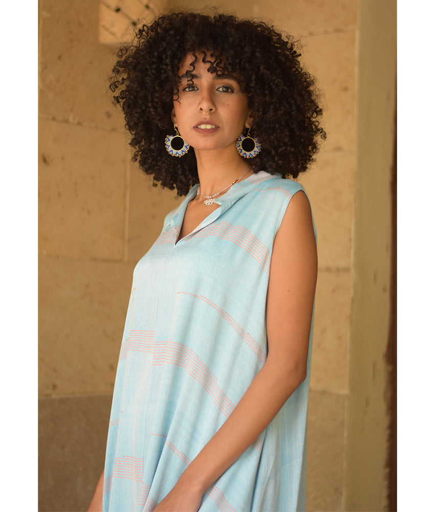 Baby Blue Handwoven Ruffle Dress handmade in Egypt & available at Jozee Boutique.