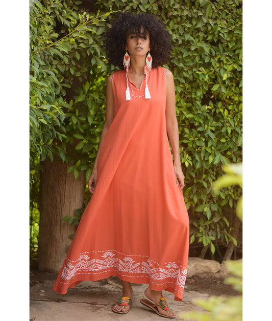 Orange Linen Dress with Ancient Egyptian Lotus Embroidery handmade in Egypt & available at Jozee Boutique.