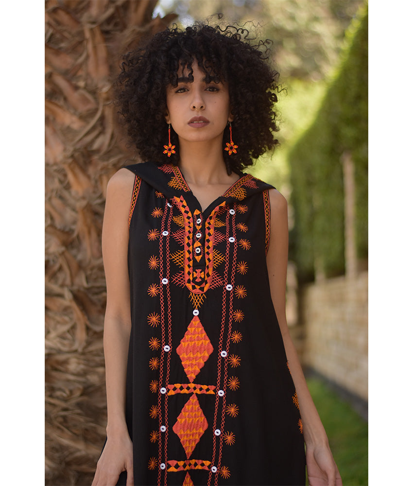 Black Siwa Heavily Embroidered Linen Dress with Hoodie handmade in Egypt & available at Jozee Boutique.