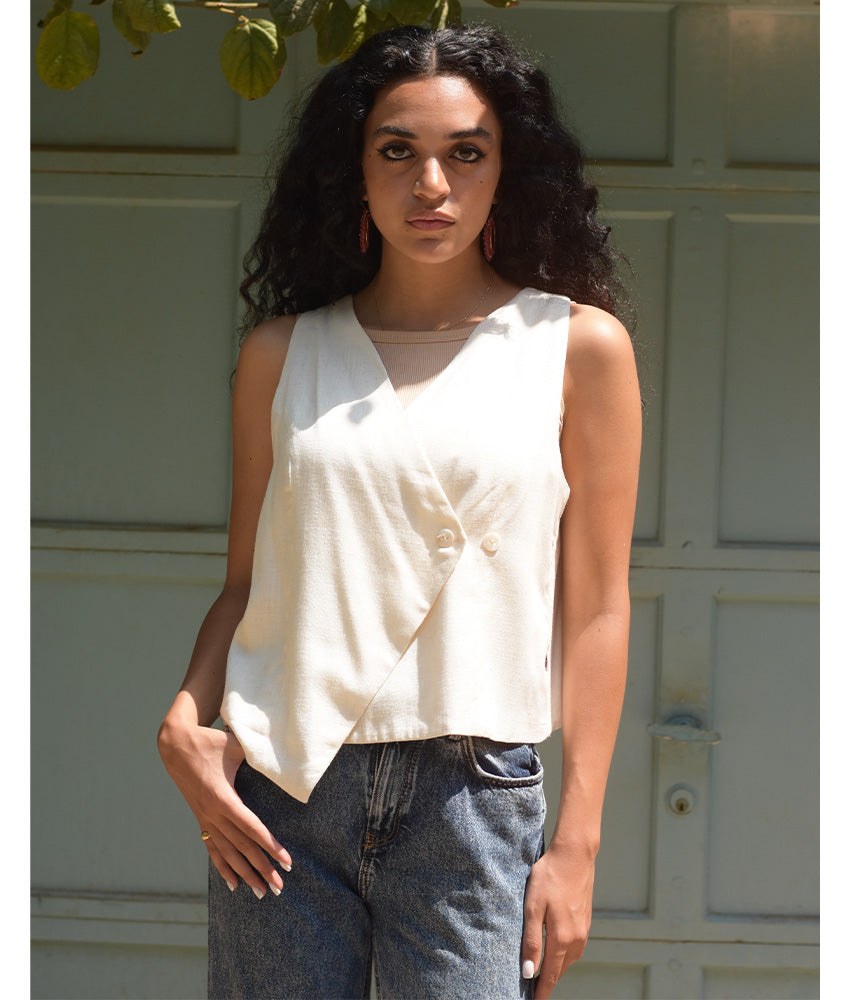 Off-White El Mahrousa Linen Wrap Vest handmade in Egypt & available at Jozee Boutique.