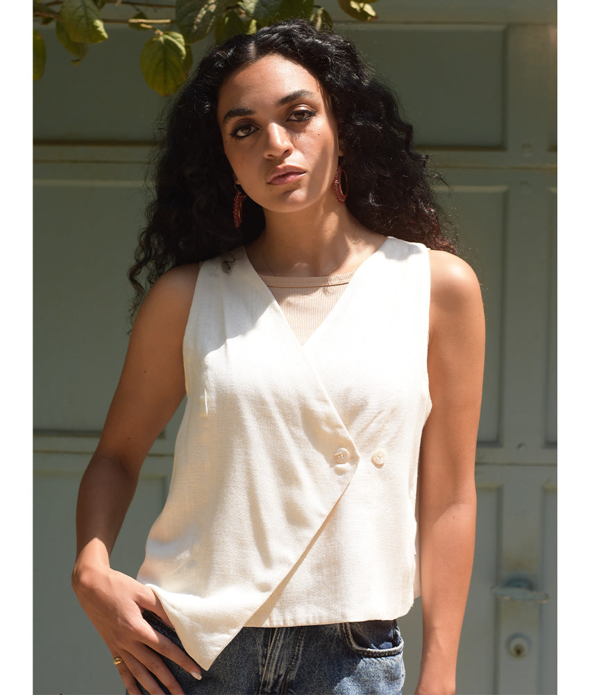 Off-White El Mahrousa Linen Wrap Vest handmade in Egypt & available at Jozee Boutique.