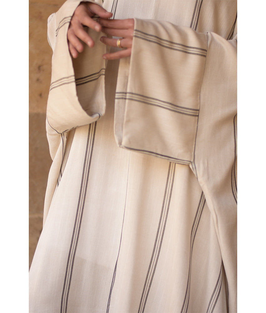 Beige Stripped Viscose Kaftan with Hoodie handmade in Egypt & available at Jozee Boutique.