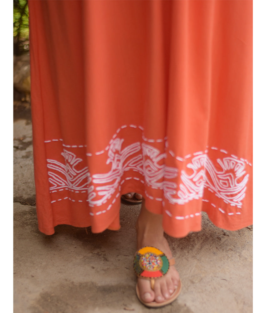 Orange Linen Dress with Ancient Egyptian Lotus Embroidery handmade in Egypt & available at Jozee Boutique.